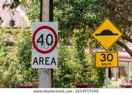 Speed limit sign and Speed Hump sign