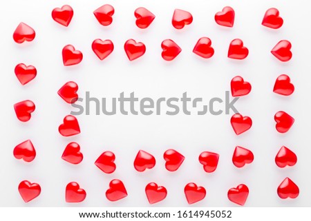 white background with red hearts and copy space
