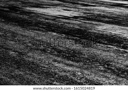 Asphalt background. Old road surface and breakdown. The courtyard is covered with asphalt. Environmental concept