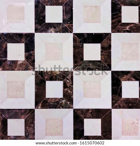 Black and white ceramic tile with cage pattern for wall decoration. Concrete stone surface background. Texture for interior design project.