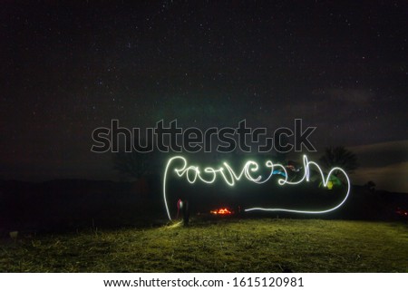 Night Sky Photography in Dehradun Uttarakhand India. Camping under night sky with full of stars on new year eve. Light painting in the snow mountains of Uttarakhand India. Night photography. - Image  