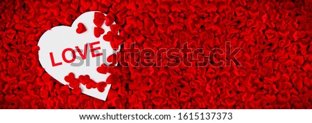 Abstract background made of red Valentine Love hearts with white heart shaped space for text