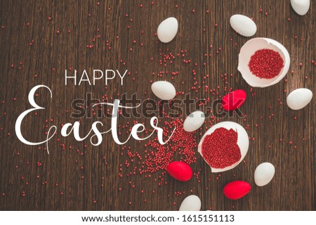 Happy Easter. Flat Lay of Golden Eggs and easter red sprinkle on wooden background. Easter concept