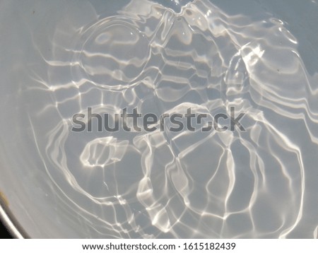 The art of abstract on metal texture blue water in the deep sea. Metal texture of water use for background