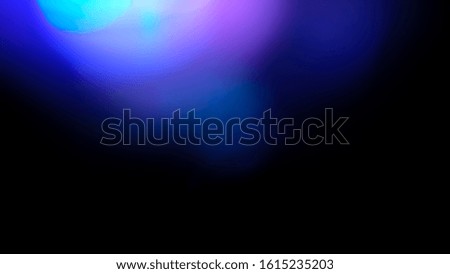 blue flare on a black background. beautiful light for design