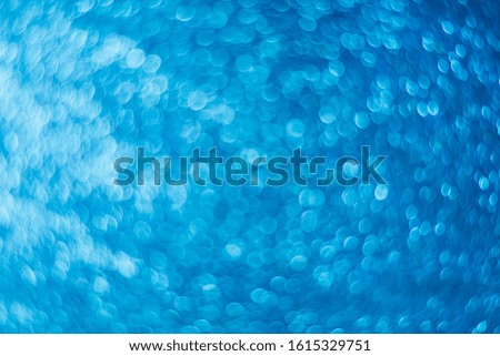 Aqua blue abstract background. Texture bokeh. Defocused image.