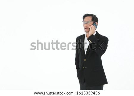 the business man lawyer attorny talking and texting message on the mobile telephone  wearing formal suit isolated on white background copyspace