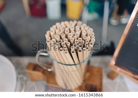 Picture of nice looking drinking straws in the glass.