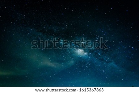 Milky way galaxy with stars and space in the universe background at thailand Royalty-Free Stock Photo #1615367863