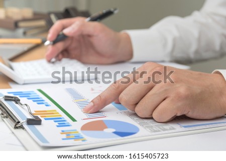 businessman working with documents in office Royalty-Free Stock Photo #1615405723