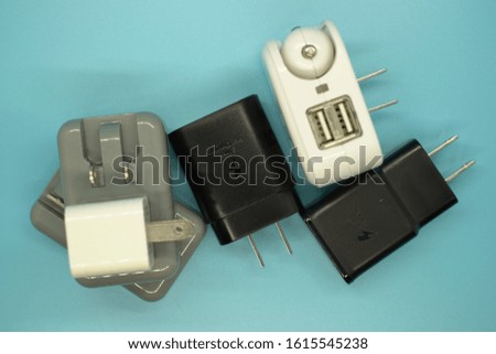 A group of different charging bricks Royalty-Free Stock Photo #1615545238