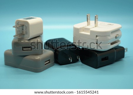 A group of different charging bricks Royalty-Free Stock Photo #1615545241