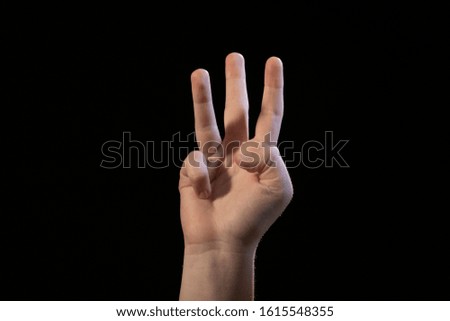 hand isolated on black background