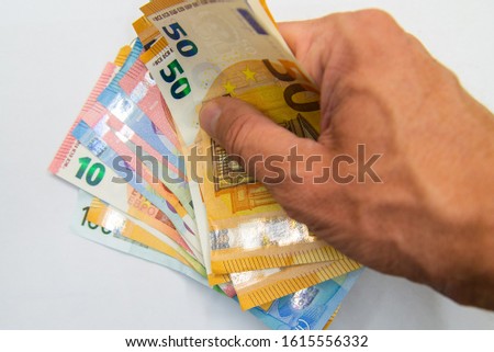 Euro banknotes isolated over white with clipping path