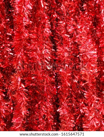 Red tinsel in the store as a background.