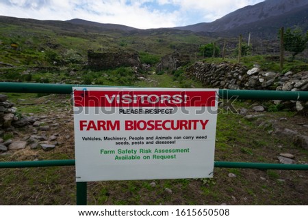 Farm biosecurity warning sign at the gate of a rural farm in county Kerry, Ireland