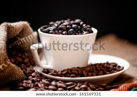 Arabic fresh bio coffee and vintage cloth packaging isolated on black
