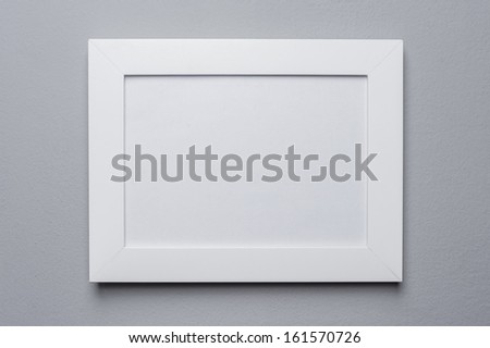 empty photo frame in woman hands