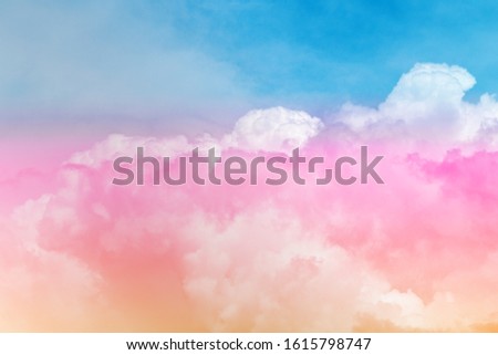 Colorful puffy fluffy pink & yellow white clouds & cloudscape on beautiful sunny blue sky horizon in tropical summer or spring sunlight & sun light rays at daylight sunshine day, copy free space  Royalty-Free Stock Photo #1615798747