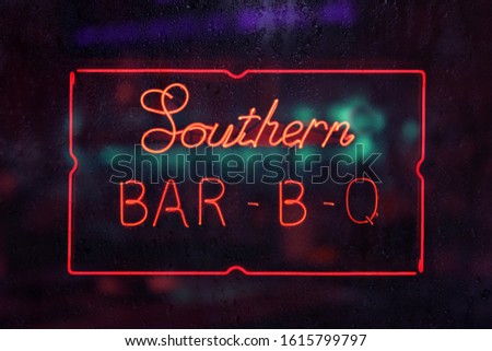 Southern Barbecue Sign in Rainy Window 