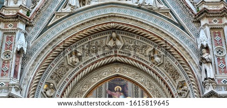 Italian Renaissance. Amazing architectural details with carving and decorations of awesome marble facade of Florence Cathedral. Medieval Art and Architecture. Italy, Florence  