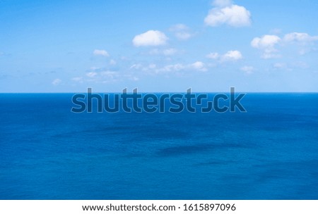 Sea view from tropical blue sea sky with sunny sky.Summer paradise sea of Phuket island.Tropical sea in Phuket.Exotic summer beach with clouds on horizon.Ocean beach relax,Vacation,Outdoor travel.