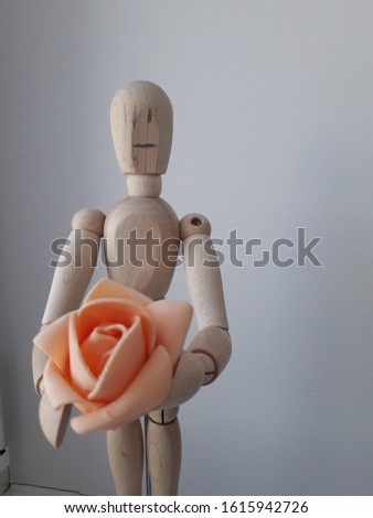 Toy for children made of wood.The wooden man. Mannequin for creating a cartoon