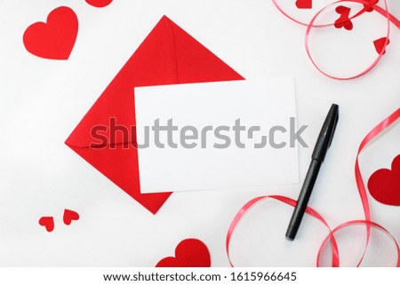 Valentine day flat lay. Card template with red rose. Pink and red hearts background