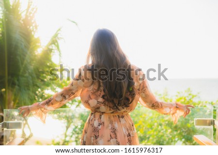 Portrait beautiful young asian women happy smile around outdoorn happy smile relax around tropical nature beach sea with palm tree
