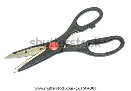 old dirty kitchen scissors on a white background