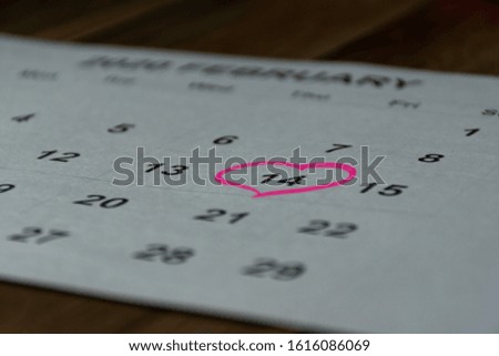 the calendar with the date of February 14 Valentine's day.