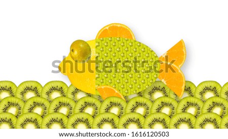 The fish consists of the fruits of lemon, mandarin and kiwi with a pear eye on the surface of an imitation of sea waves on a white background.