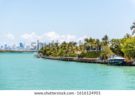 Bal Harbour, Miami Florida with light green turquoise ocean Biscayne Bay Intracoastal water and cityscape skyline of Sunny Isles Beach