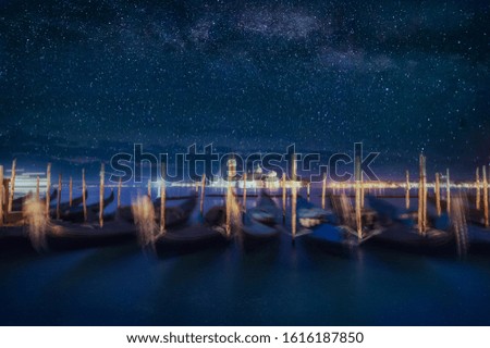famous gondola city view under starry sky. Venice, Italy. picture with long exposure