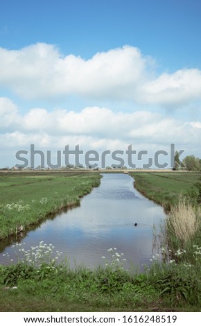 River and blue sky. Netherlands. Summer. 
