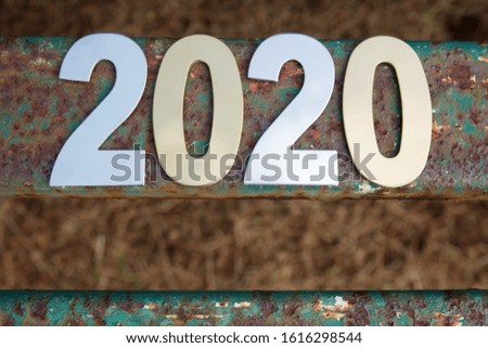 2020 metal letters put on iron rust. Happy New Year 2020.                      