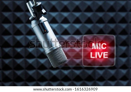 For radio station: background with professional microphone and on air sign