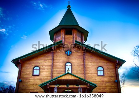 Orthodox wooden church at dawn. Temple of the Blessed Matrona of Moscow Soligorsk
