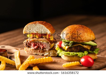 Fresh home-made hamburger served on wood