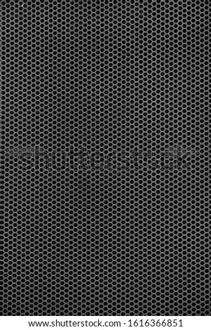Black iron speaker grid texture.Black honeycomb background