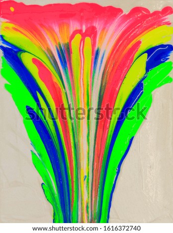 Psychedelic looking eruption of Green, Blue, Red, Yellow  acrylic paint  on an artists canvas
