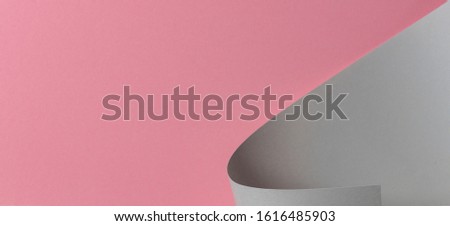 geometric shape gray and light pink color paper background
