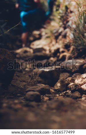 Dusty path walked by many with a rewarding view. Royalty-Free Stock Photo #1616577499