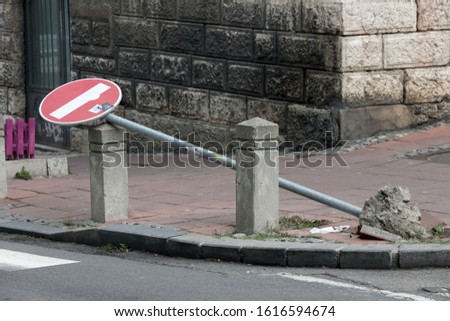 Damaged road sign stop on the street