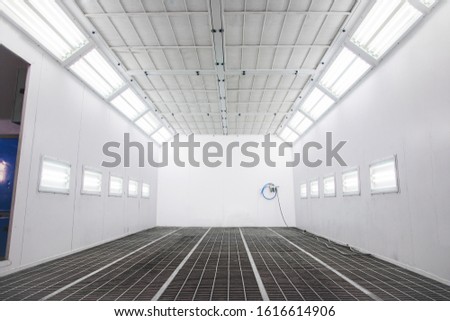 new spray booth for cars with lights on Royalty-Free Stock Photo #1616614906