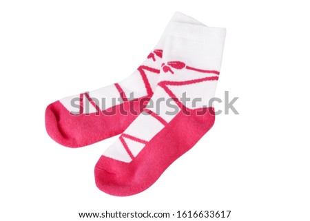 Pair of socks with pink bow pattern on the white background. Child's  socks