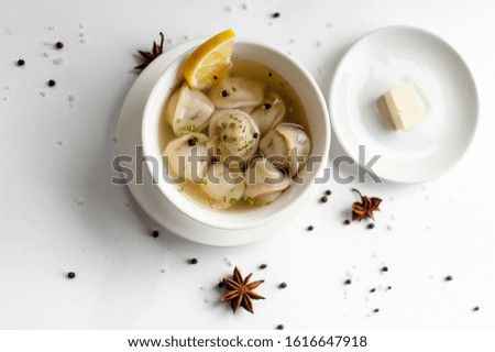 dumplings in a white bowl 