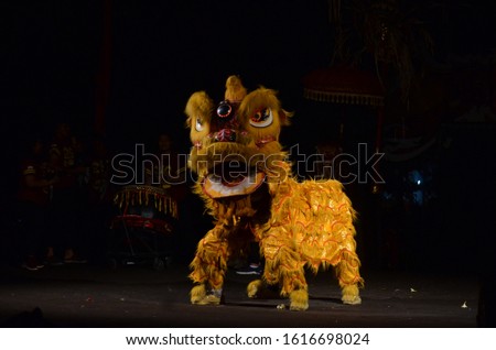 a lion dance performance on stage