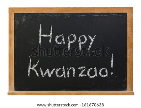 Happy Kwanzaa written in white chalk on a black chalkboard isolated on white