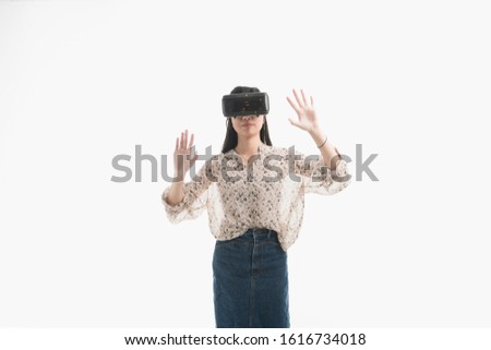 woman wearing virtual reality glasses. Amazing experience in abstract vr world. picture